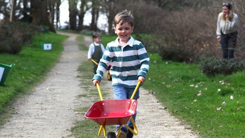 Children enjoying a spring family trail at Petworth